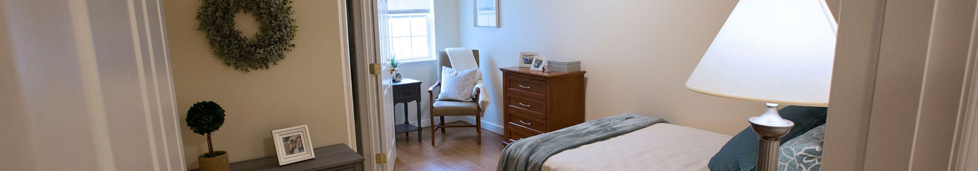 Senior living residence bedroom with walk in closet